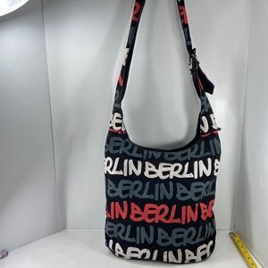 Robin and Ruth Berlin bag hundred percent cotton red blue black and white